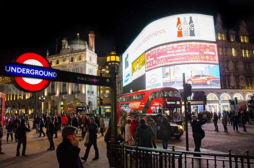 Emergency response to burst water main at Piccadilly Circus, London, with Sykes Pumps equipment deployed to manage flooding.