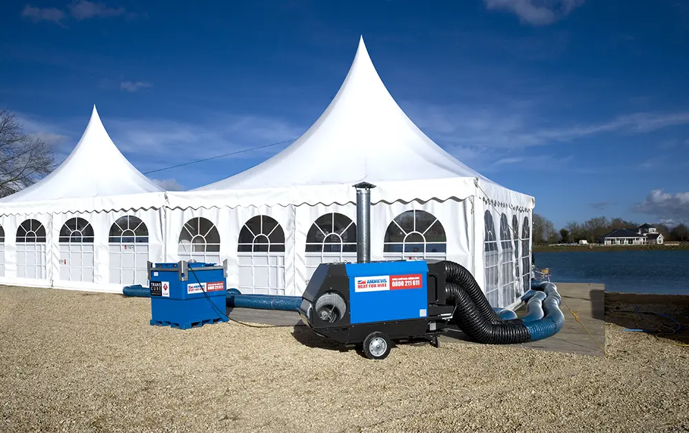 Indirect fired heater providing warm air to a marquee
