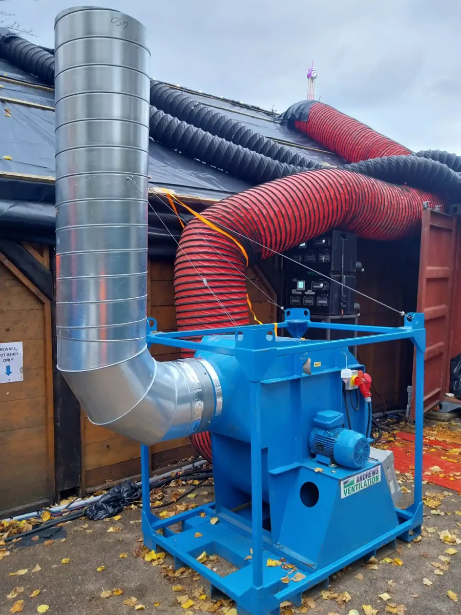 An Andrews Ventilation FV900 S2 centrifugal fan installed outdoors with a custom vertical ducting system for safe smoke discharge.