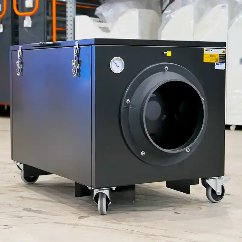 black, industrial-grade Filterbox air filtration unit on wheels, featuring a large circular duct connection and an integrated pressure gauge for monitoring performance.