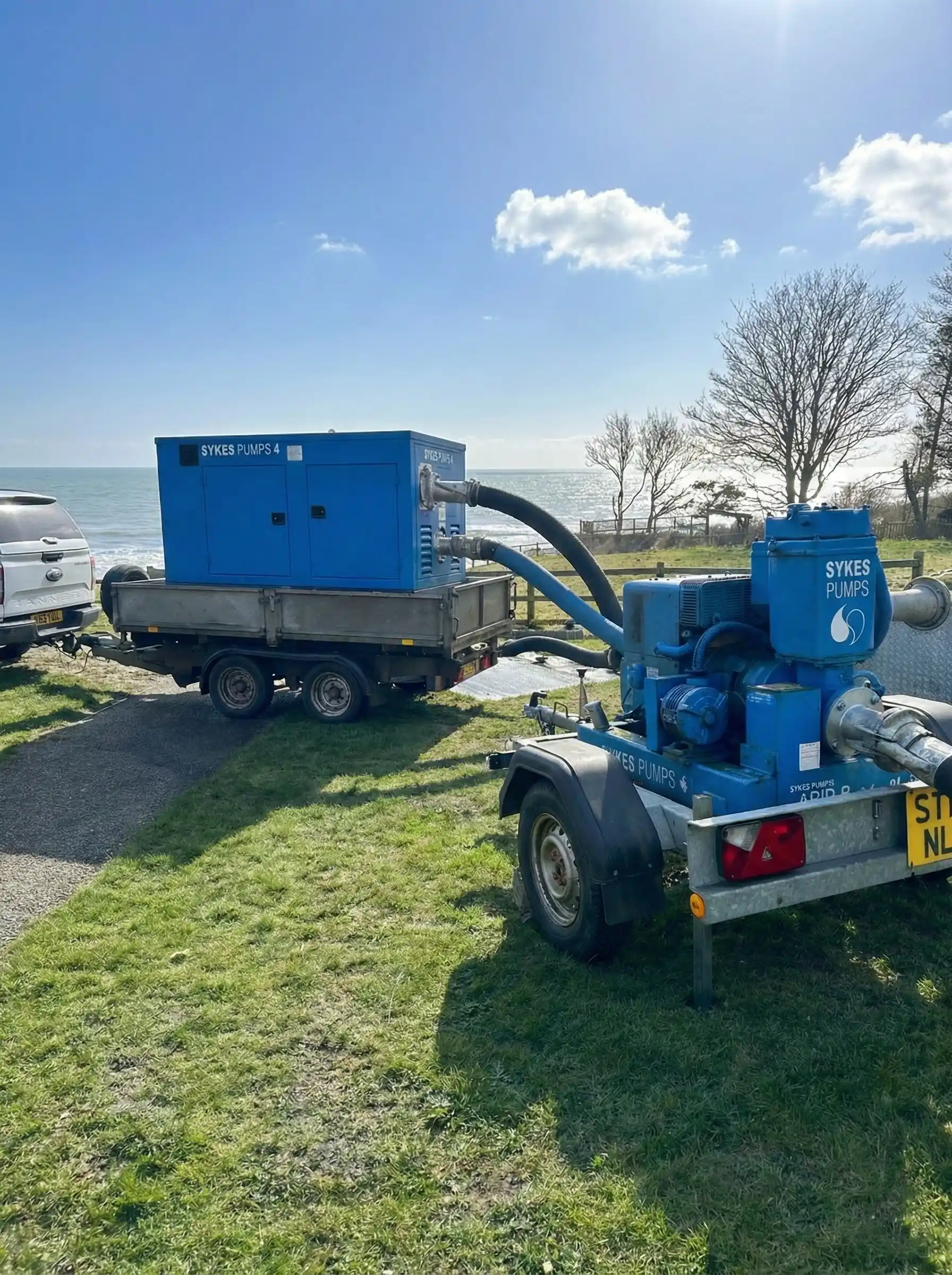 Full deployment of a Sykes Pumps Super Wispaset 150 and a smaller Rapid Response pump on trailers