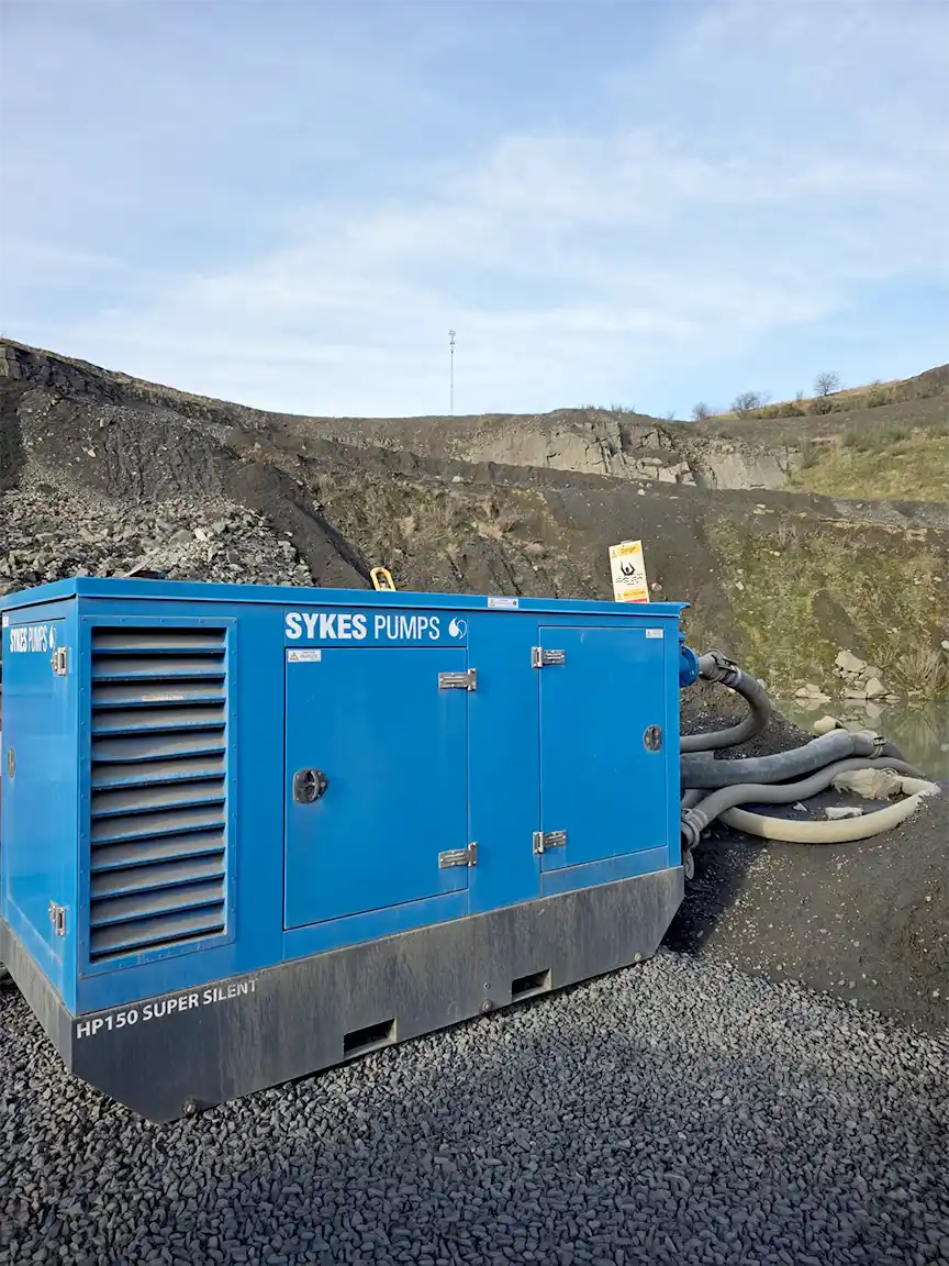 HP150 Super Silenced high-head pump installed at a quarry site to manage vertical lift and high-flow water removal during heavy rainfall and emergency dewatering operations.