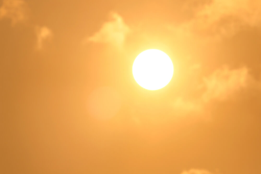 Global heatwave and climate stress concept highlighting rising summer temperatures impacting UK businesses