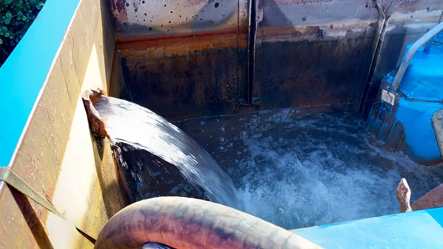 Clean water being discharged from a Sykes Pumps treatment system during a quarry lake dewatering and water quality project in West Sussex.